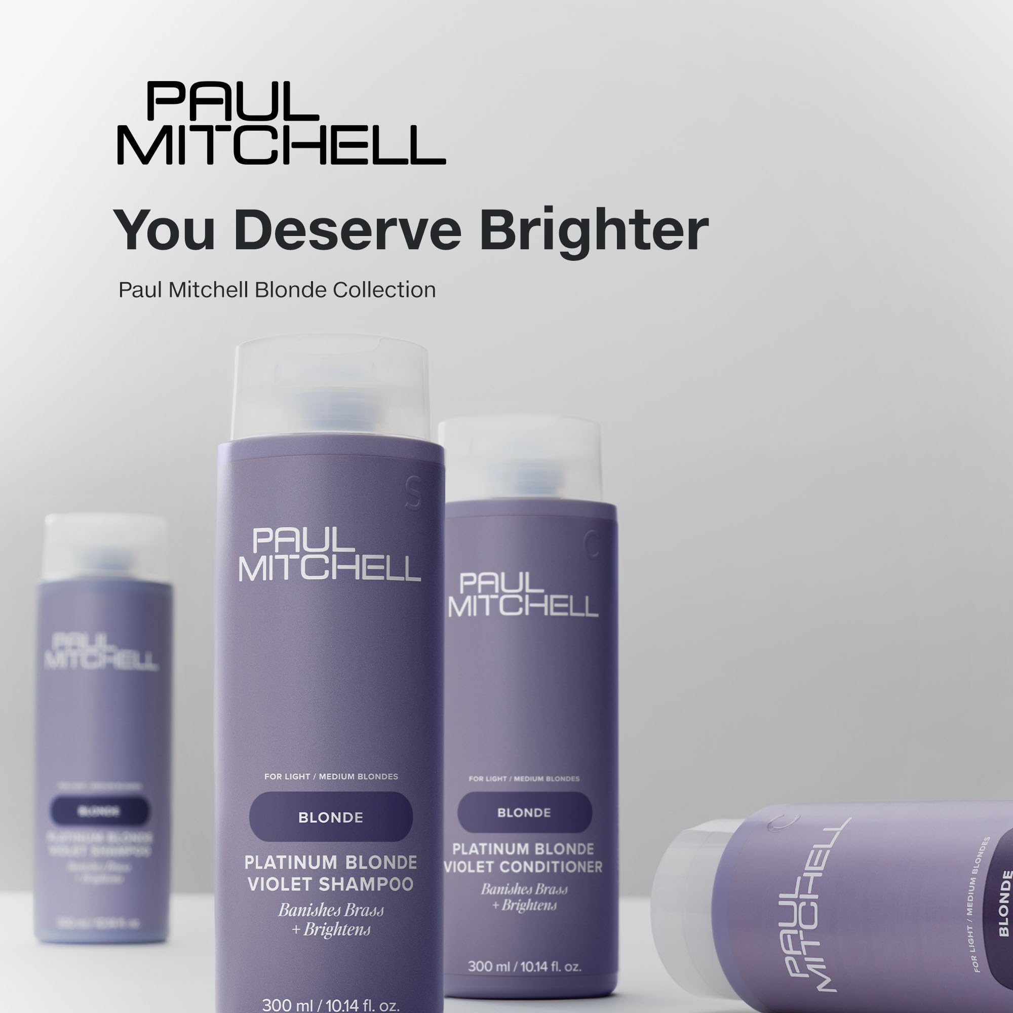Paul Mitchell Platinum Blonde Violet Conditioner, fragancia fresca de pepino y melón para una experiencia agradable.