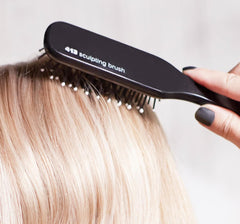 Paul Mitchell Pro Tools 413 Sculpting Brush detangling wet or dry hair for versatile styling.