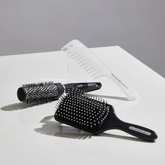 Paul Mitchell Pro Tools 427 Paddle Brush long hair use showing lift during styling