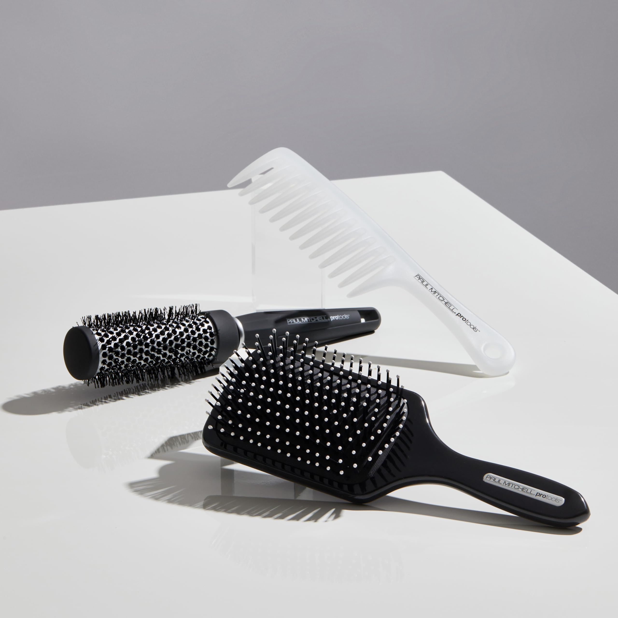 Paul Mitchell Express Ion Round Brush large barrel adds volume for a sleek look
