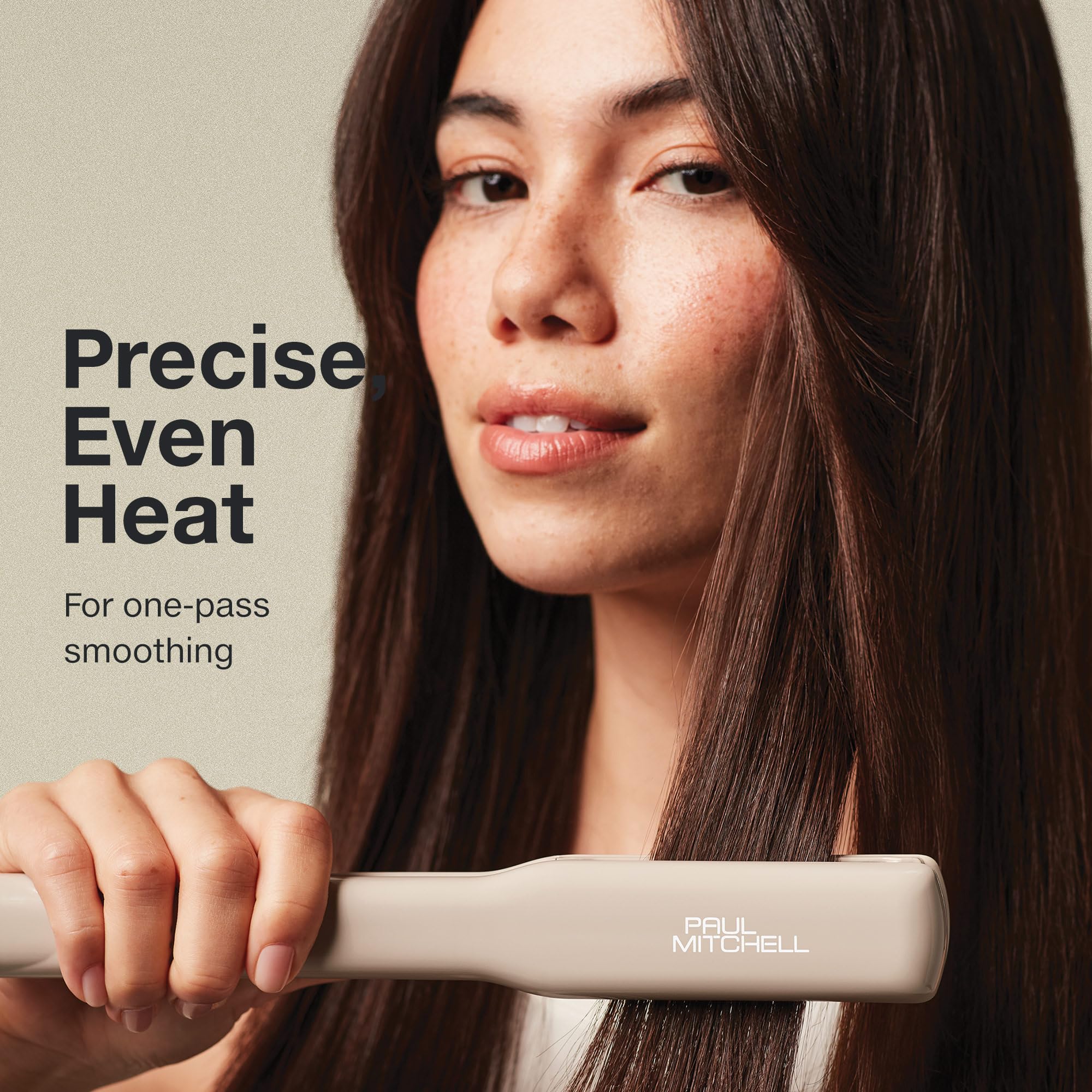 Paul Mitchell Smooth+ Ceramic Flat Iron in use on hair