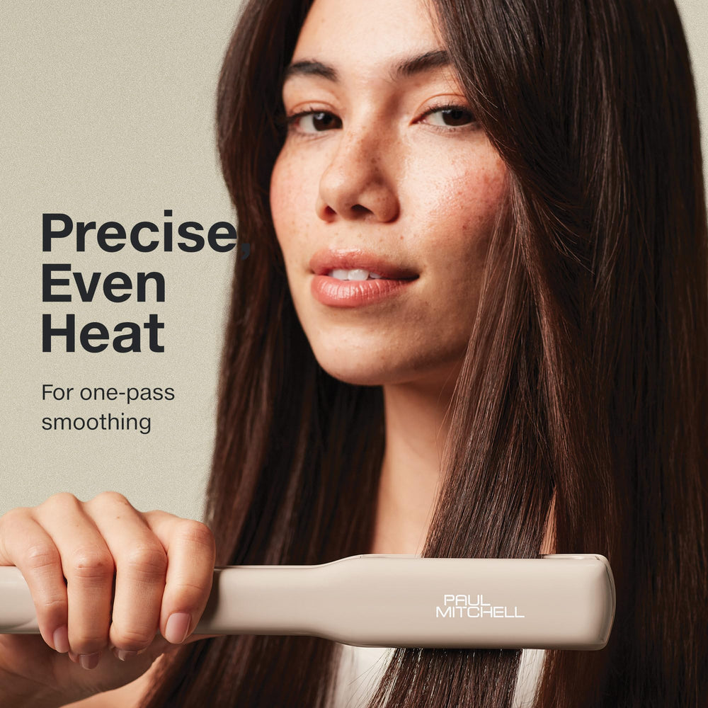 Paul Mitchell Smooth+ Ceramic Flat Iron in use on hair