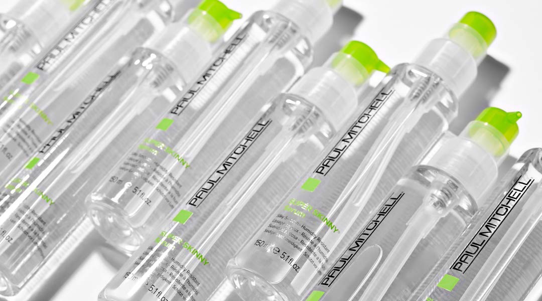 Paul Mitchell Super Skinny Serum applied to damp hair for smoothing before drying
