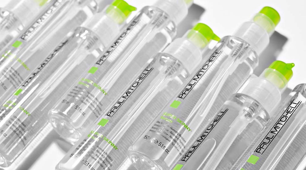 Paul Mitchell Super Skinny Serum applied to damp hair for smoothing before drying