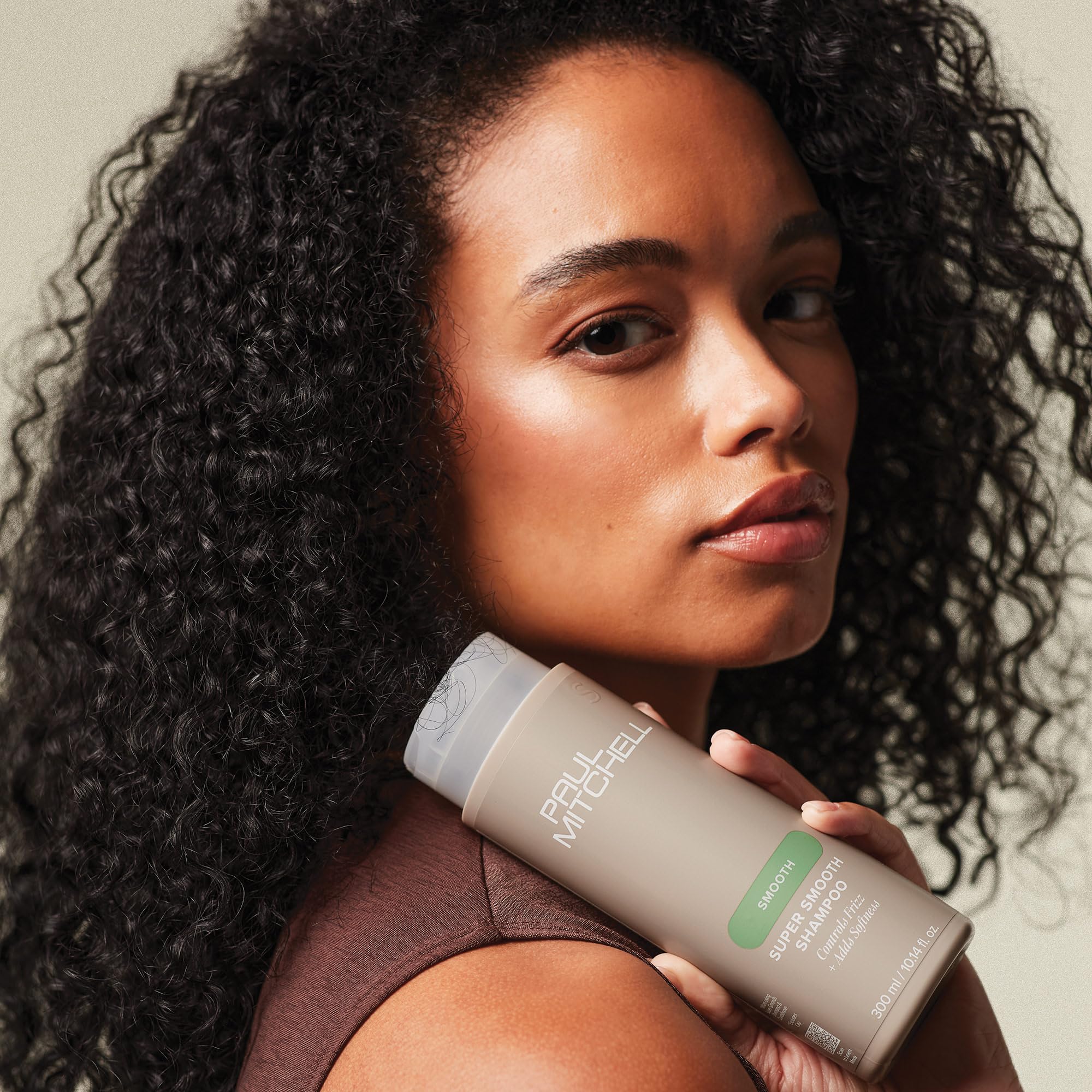 Paul Mitchell Super Smooth Shampoo packaging PCR material signals eco-friendly packaging.