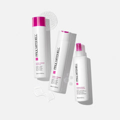 Close-up of Paul Mitchell label highlighting strengthening benefits.