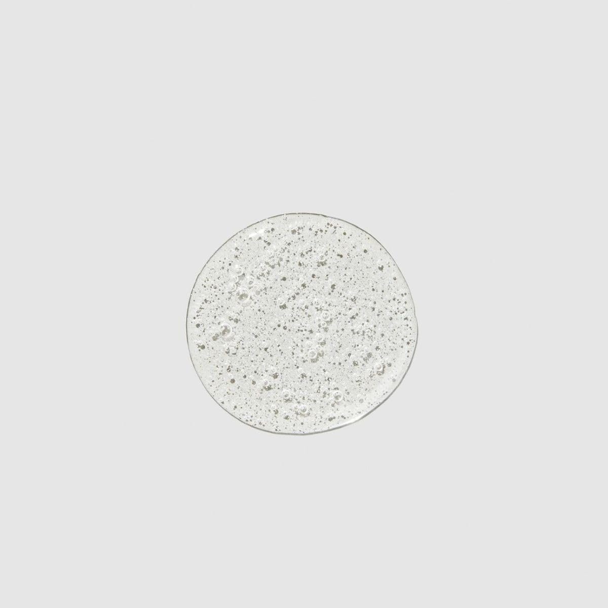 Paul Mitchell Super Strong Shampoo texture closeup shows creamy, conditioning-rich consistency