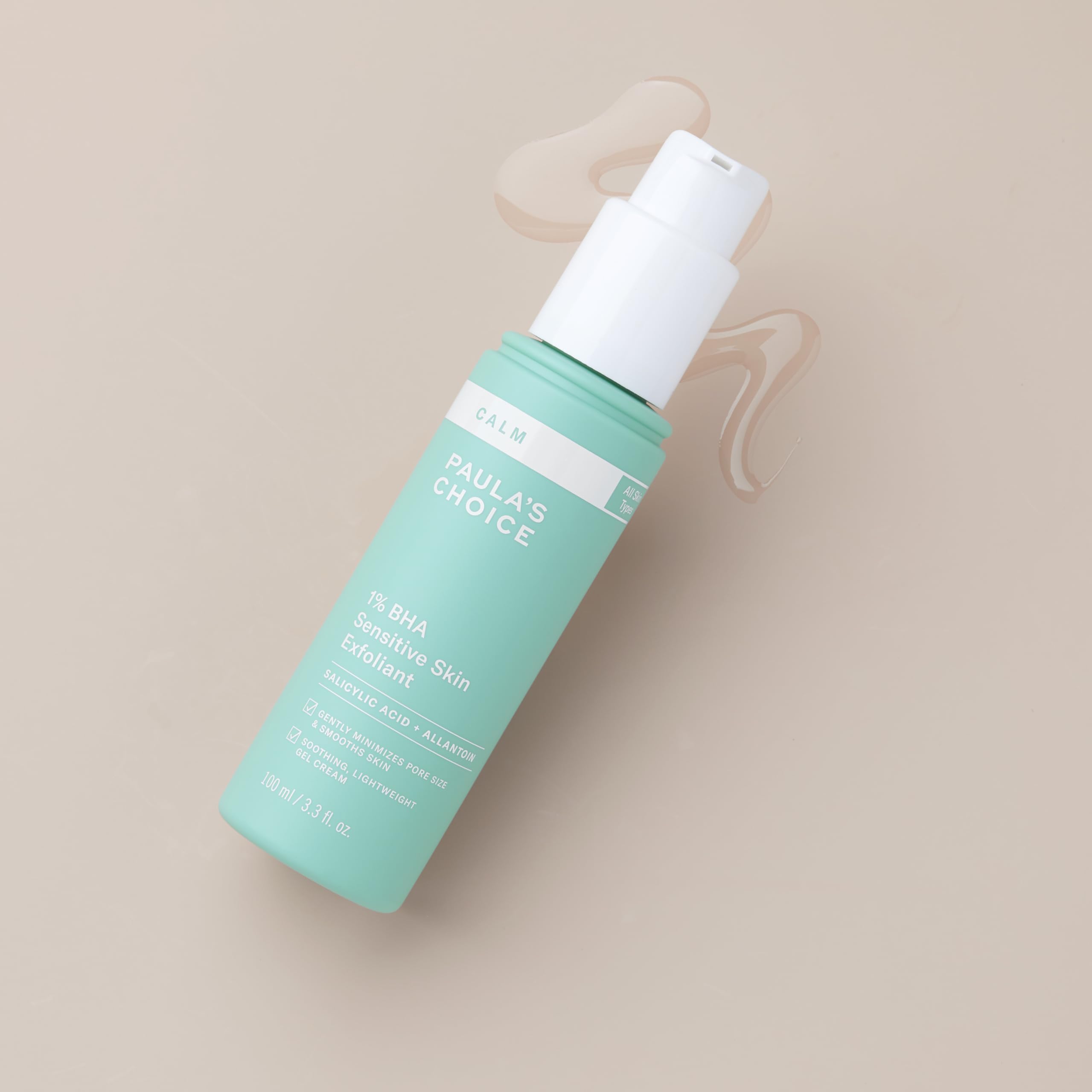 Paula's Choice CALM 1% BHA bottle cap and pump against clean background.