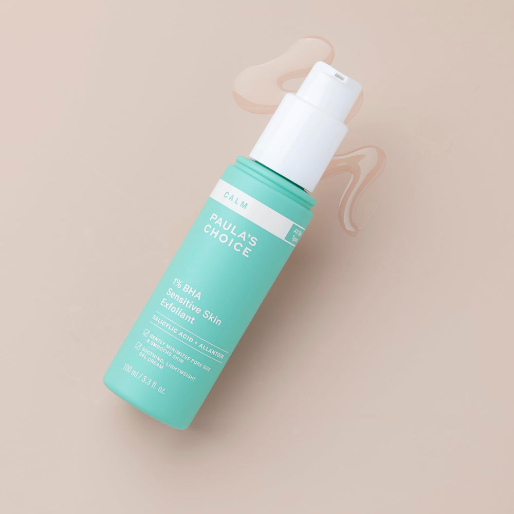 Paula's Choice CALM 1% BHA bottle cap and pump against clean background.