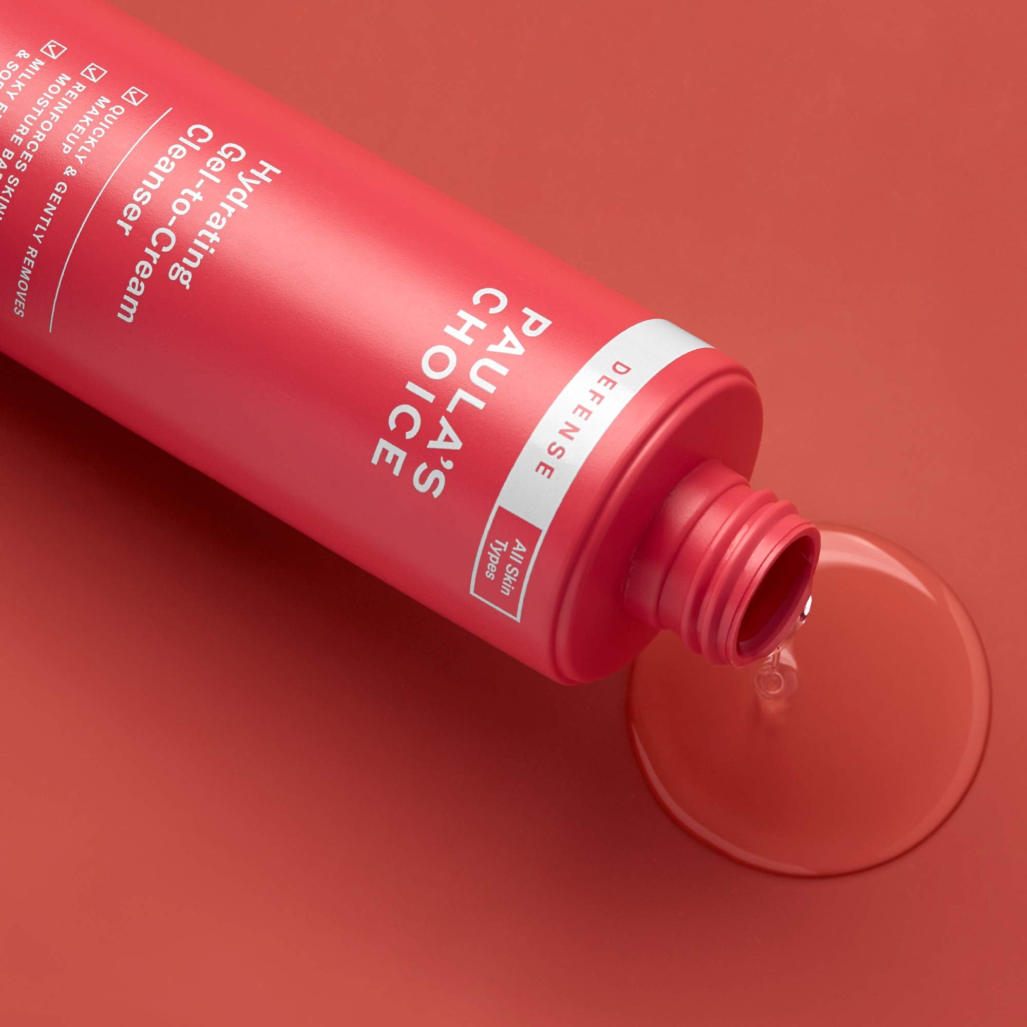 Paula's Choice Defense Cleanser bottle with pump for easy dispensing.