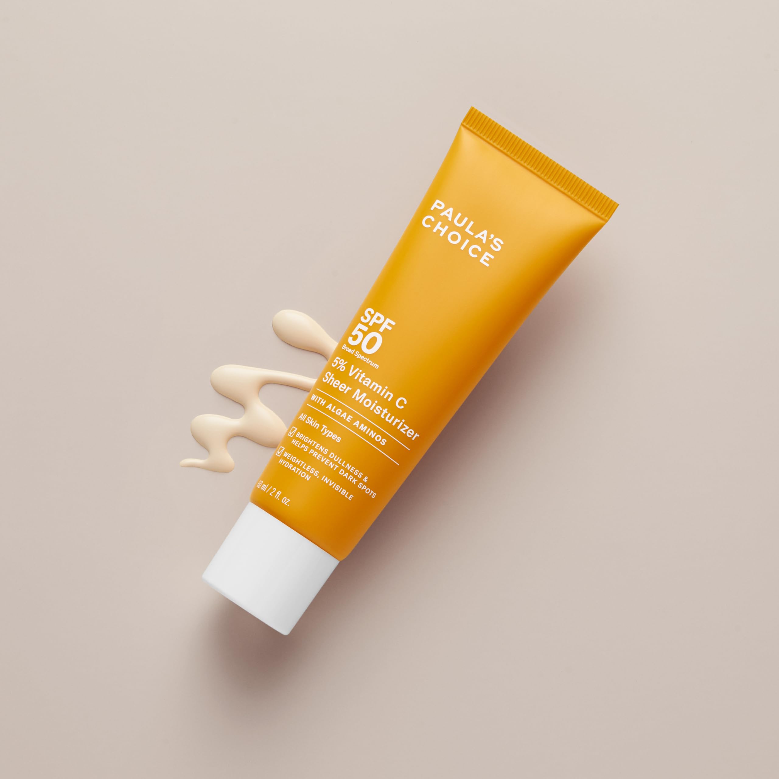 Paula's Choice sunscreen bottle shows SPF 50 and protection.