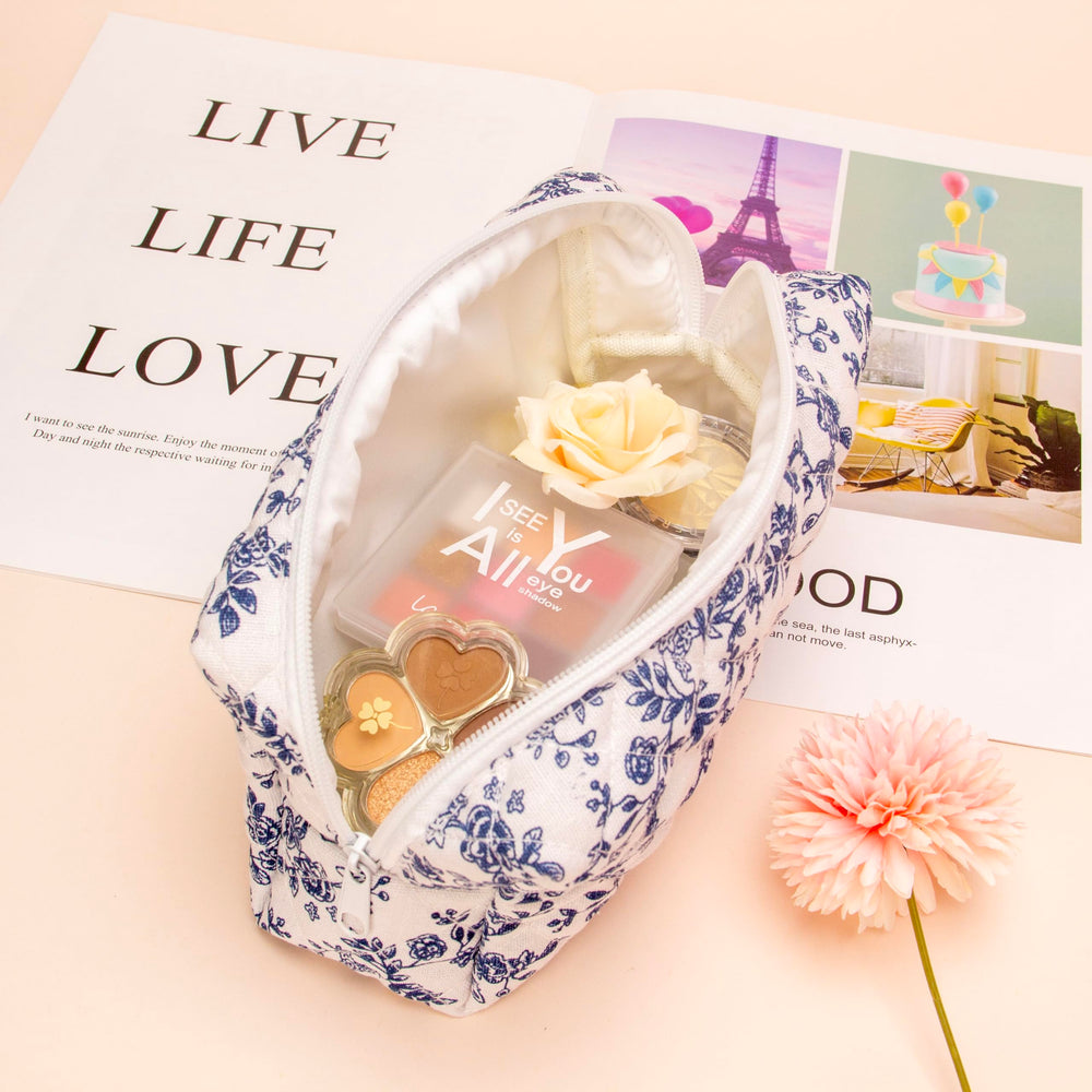 PAZIMIIK bag with zipper-close detail and compact portable design