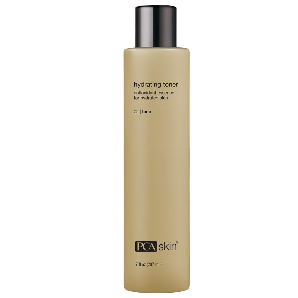 PCA SKIN Hydrating Toner bottle on a bathroom vanity.