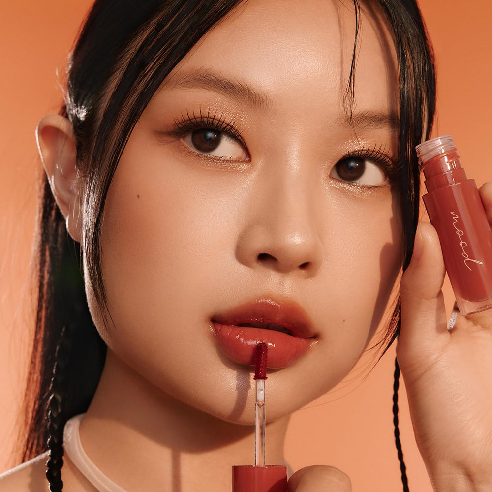 Peripera Ink Mood Glowy Tint, sin filme blanco en labios para mayor comodidad.