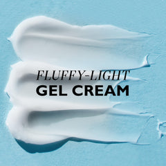 Hand applying Water Drench cream to demonstrate quick absorption