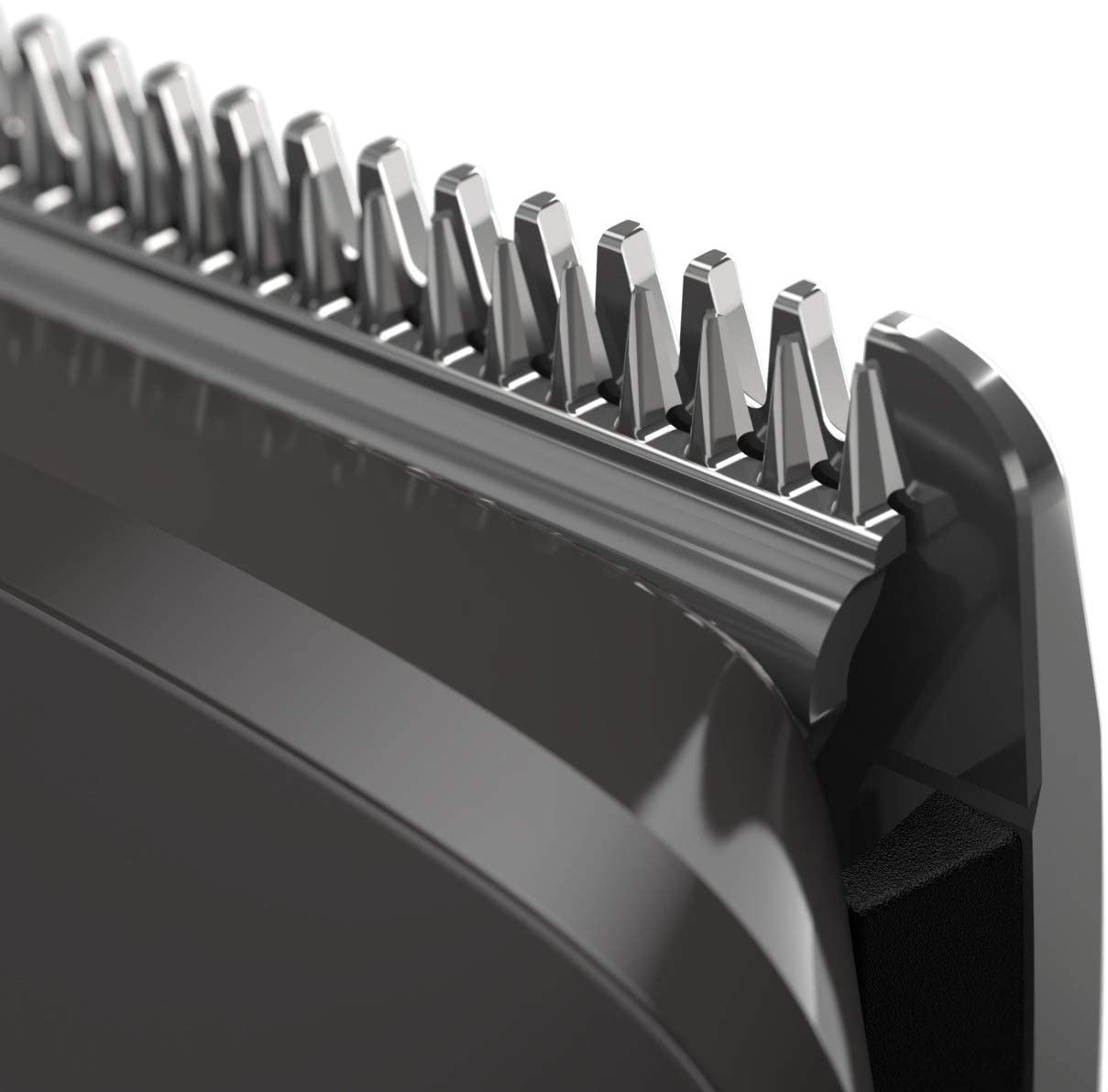 Philips Multi Groomer 8000 Series ergonomic metal frame and grip in hand.