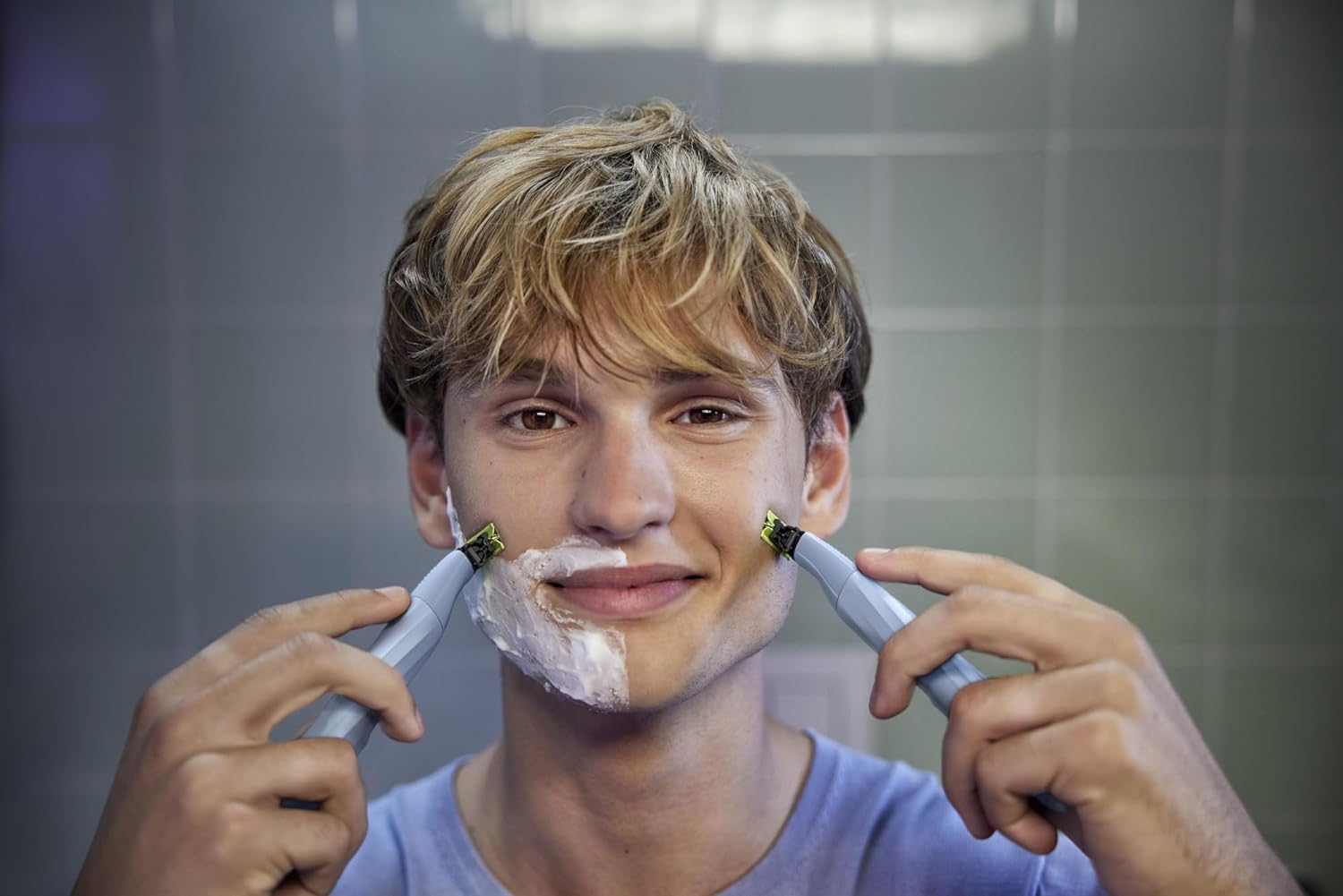 Philips OneBlade First Shave in-shower use demonstrates convenient cleanup after shaving.