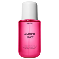 PHLUR Amber Haze bottle close-up highlighting warm amber scent.