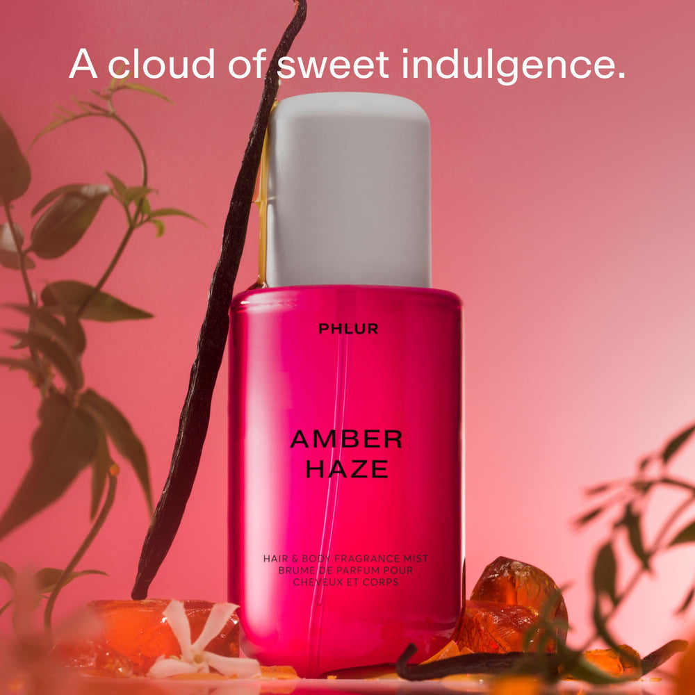 PHLUR Amber Haze hair-application spray for subtle daily fragrance.