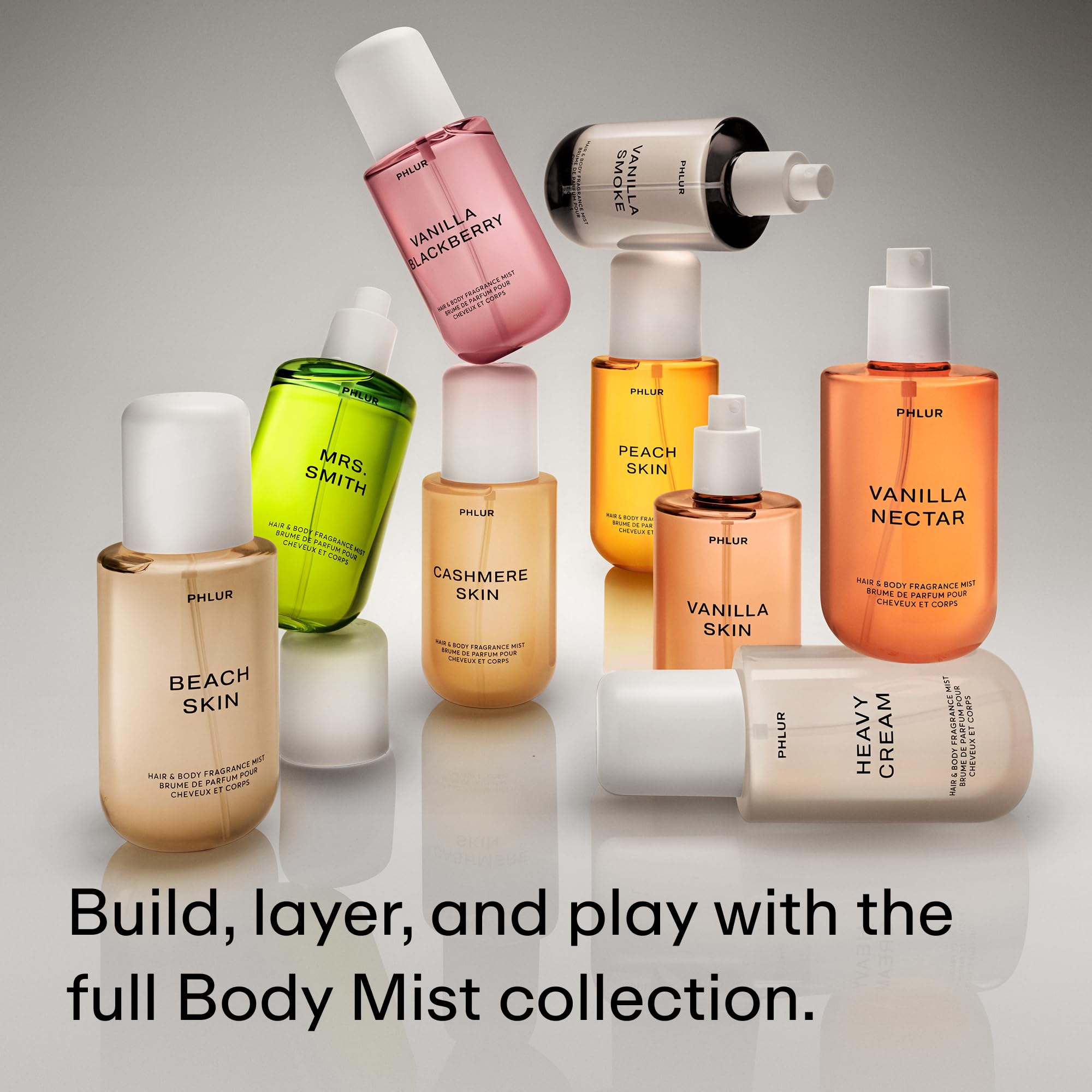 PHLUR Beach Skin Mist sprayed on skin for daily layering