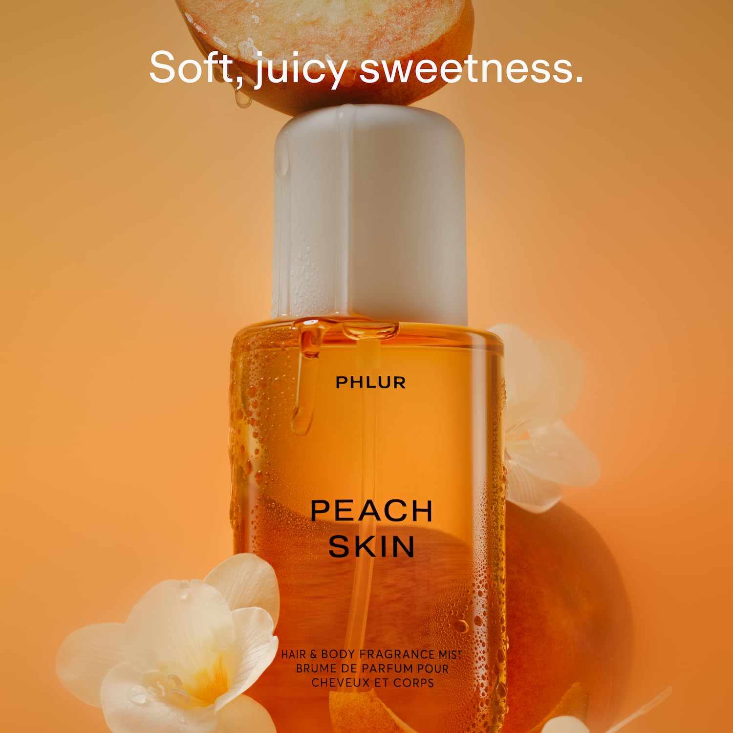 PHLUR Peach Skin Body Mist mist spray shown for light, all-day subtle wear.