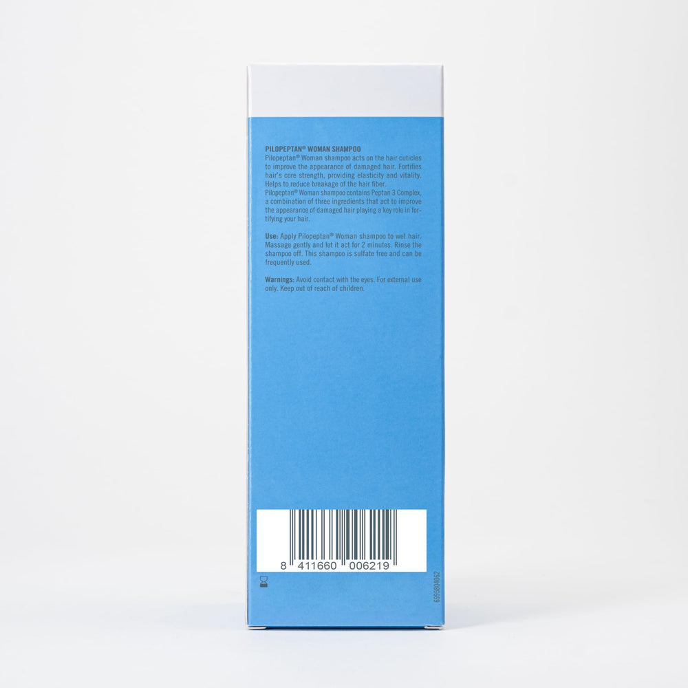 Bottle label emphasizes volumizing formula of Pilopeptan Woman Shampoo