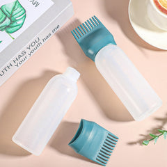 Pimoys pump-action applicator delivers dye smoothly through the comb head for clean application.
