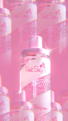 Pink Sugar hair perfume bottle with sun motif suggesting UV protection for hair