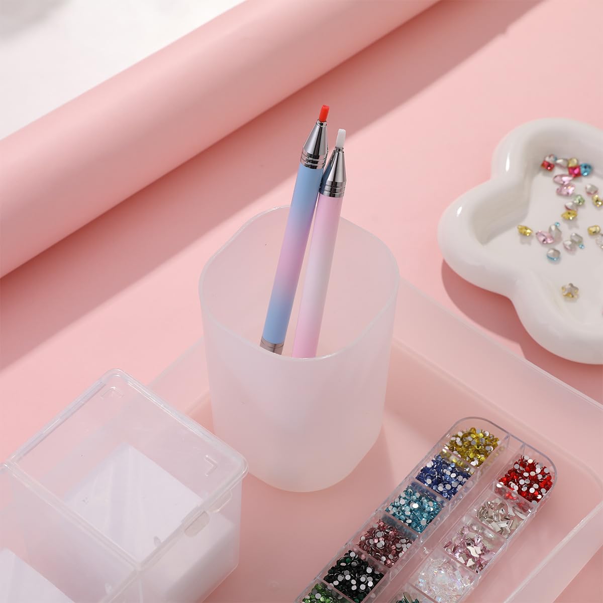 Pinkluce ergonomic rhinestone applicator offers comfortable grip.
