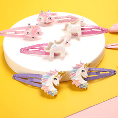 PinkSheep child wearing hair clip demonstrates kid-friendly size and gentle hold.
