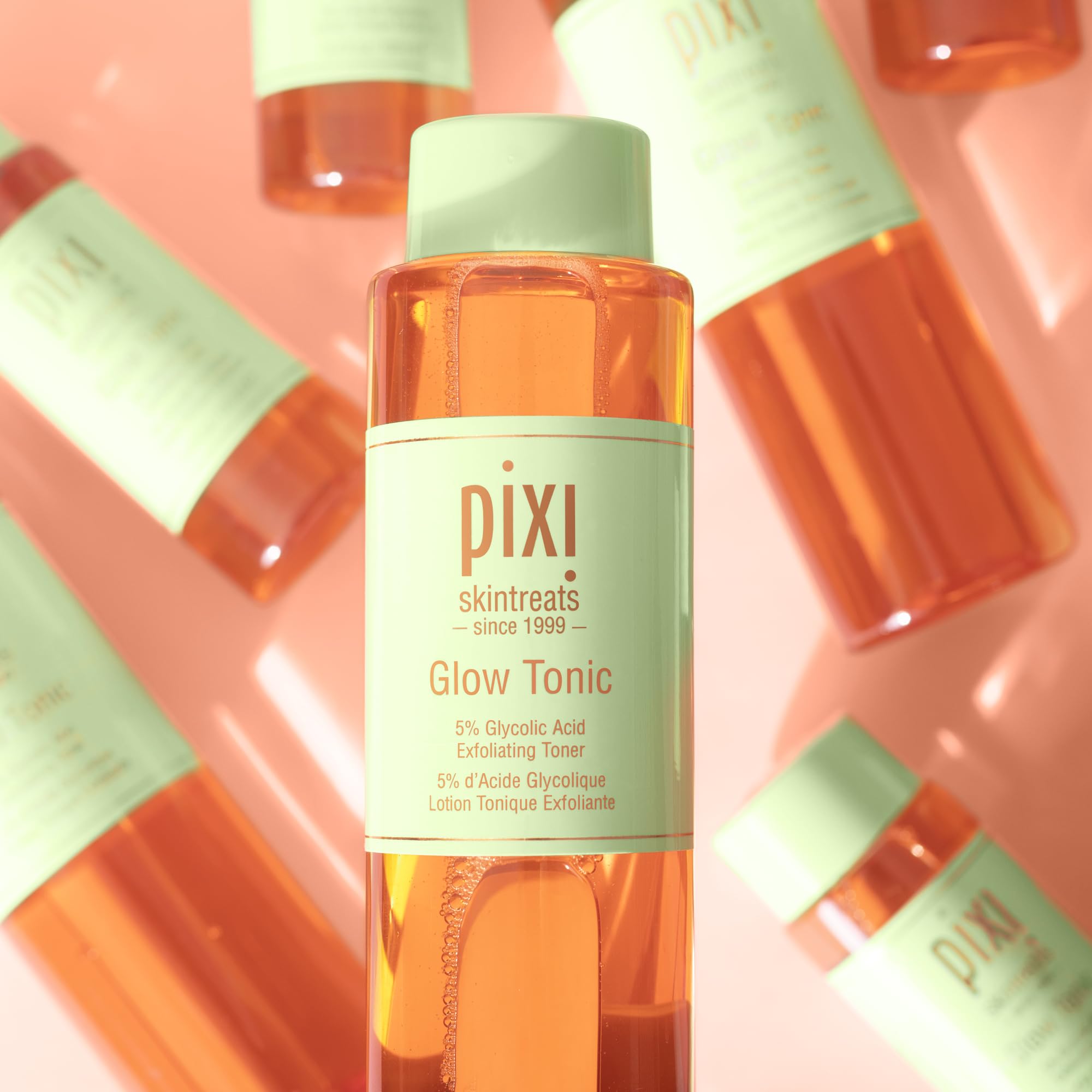 Pixi Glow Tonic on the neck and décolletage swipe for even-toned skin prep.