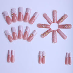 plalely long square nails featuring pearl charms for a chic accent