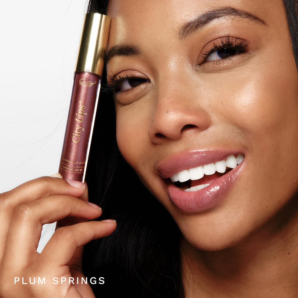 Plum Springs shade on lips providing bronze metallic sheen