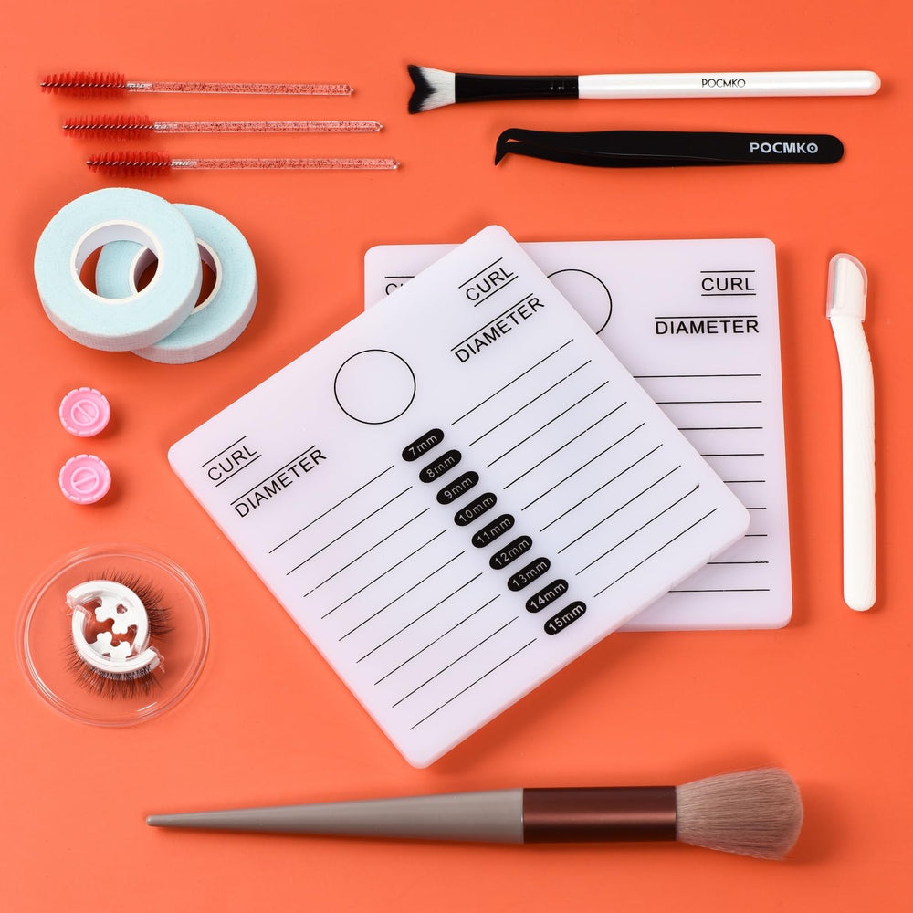 POCMKO white and black brushes in a premium lash care kit.