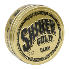 Pomada Shiner Gold, envase 3.5 oz, fijación estable para peinados.
