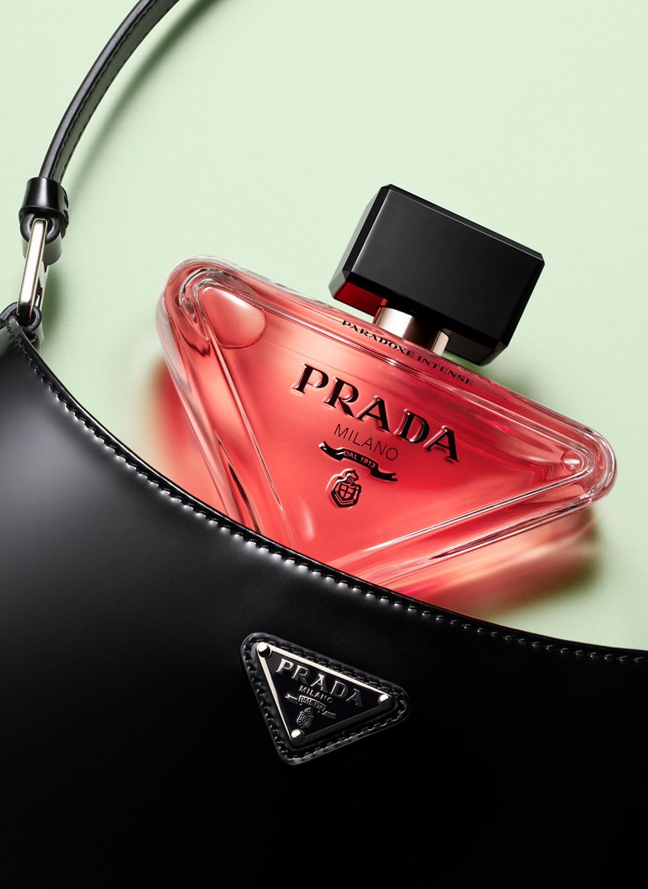 Prada Paradoxe Intense bottle back shows branding for trusted luxury.