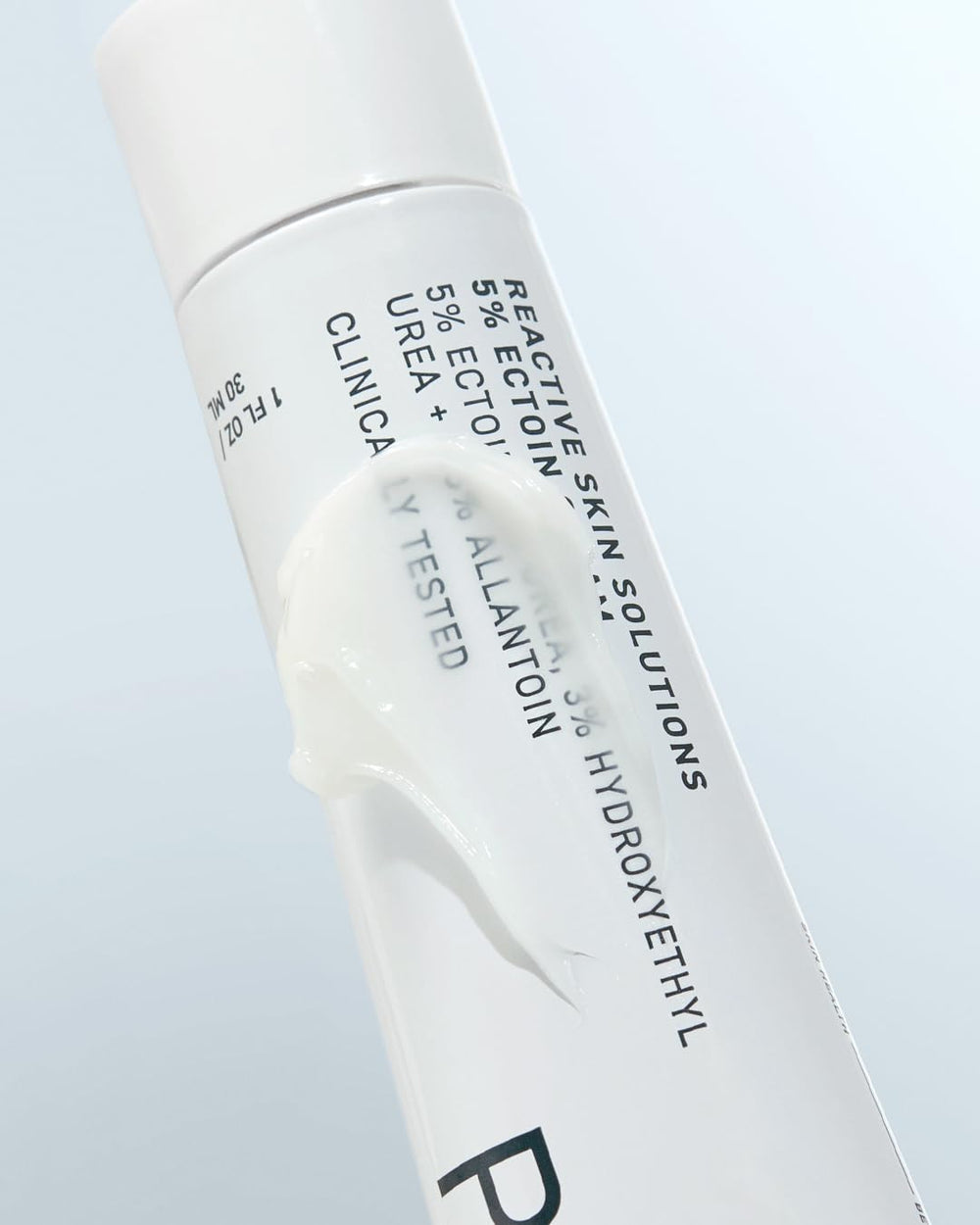 Cream applied to clean cheek showing calm skin