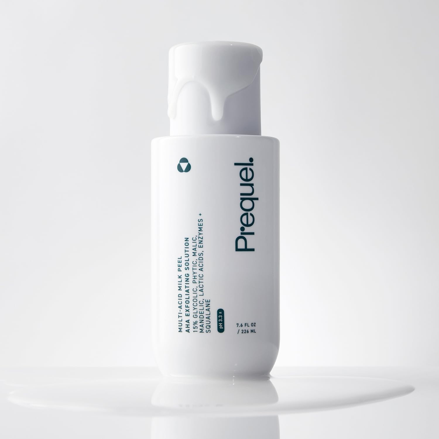 Drop dispensed from Prequel Milk Peel bottle onto fingertip for use