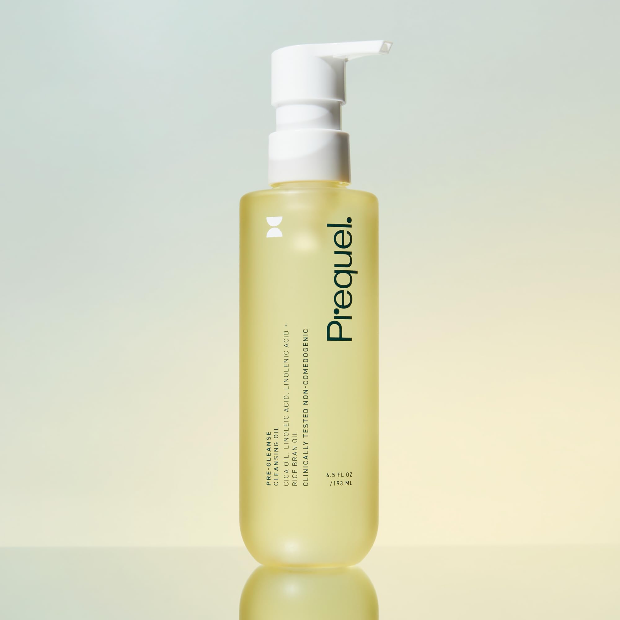 Prequel Skin Pre-Gleanse Oil Cleanser applied by hand for makeup removal