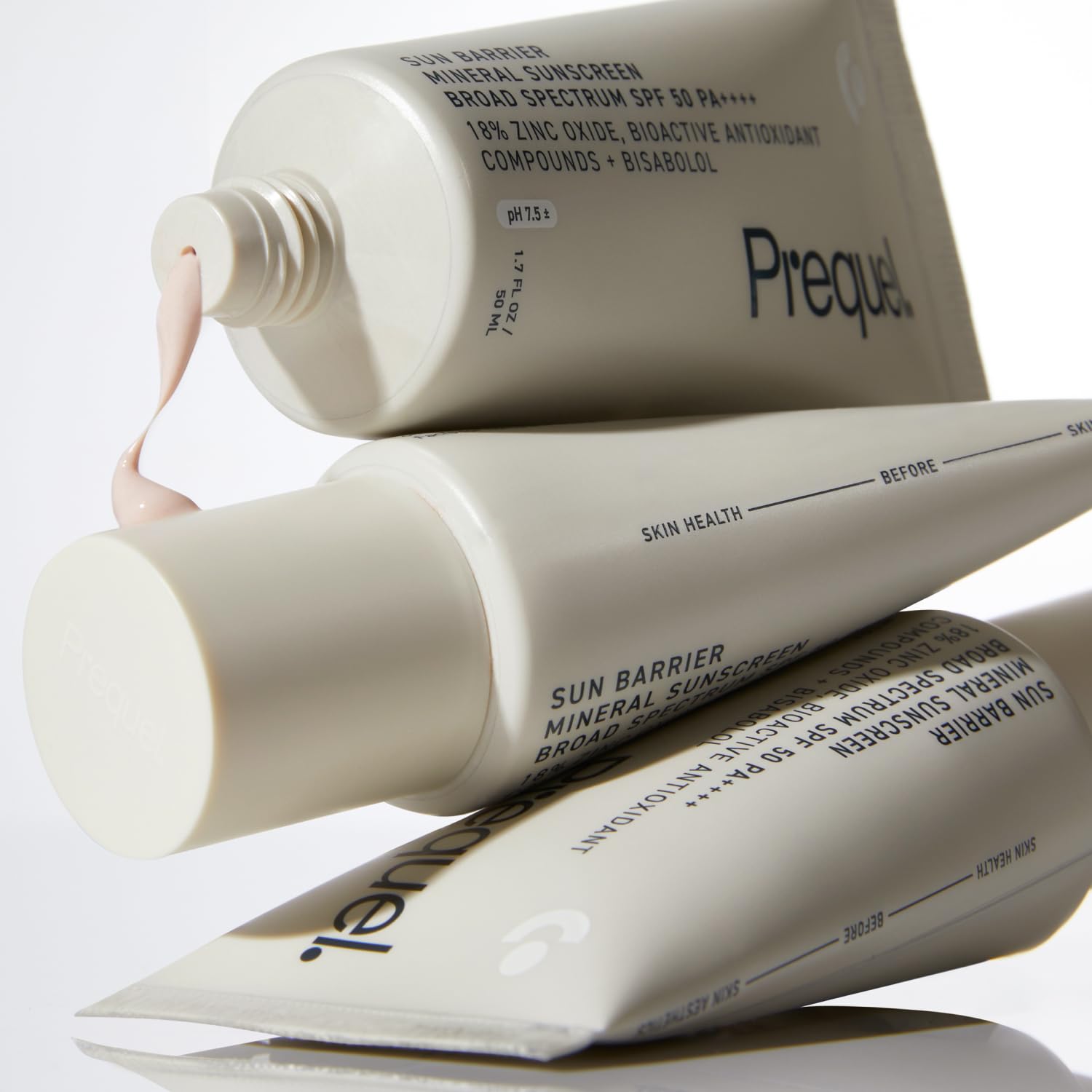 Applying Prequel Sun Barrier on the face for gentle protection.
