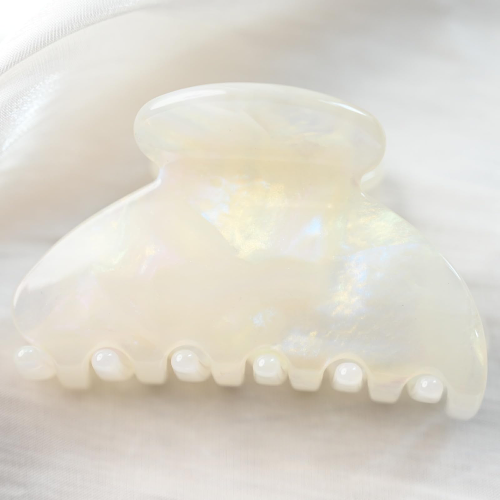Prettyou pinza de pelo resistente al agua, ideal para actividades al aire libre.