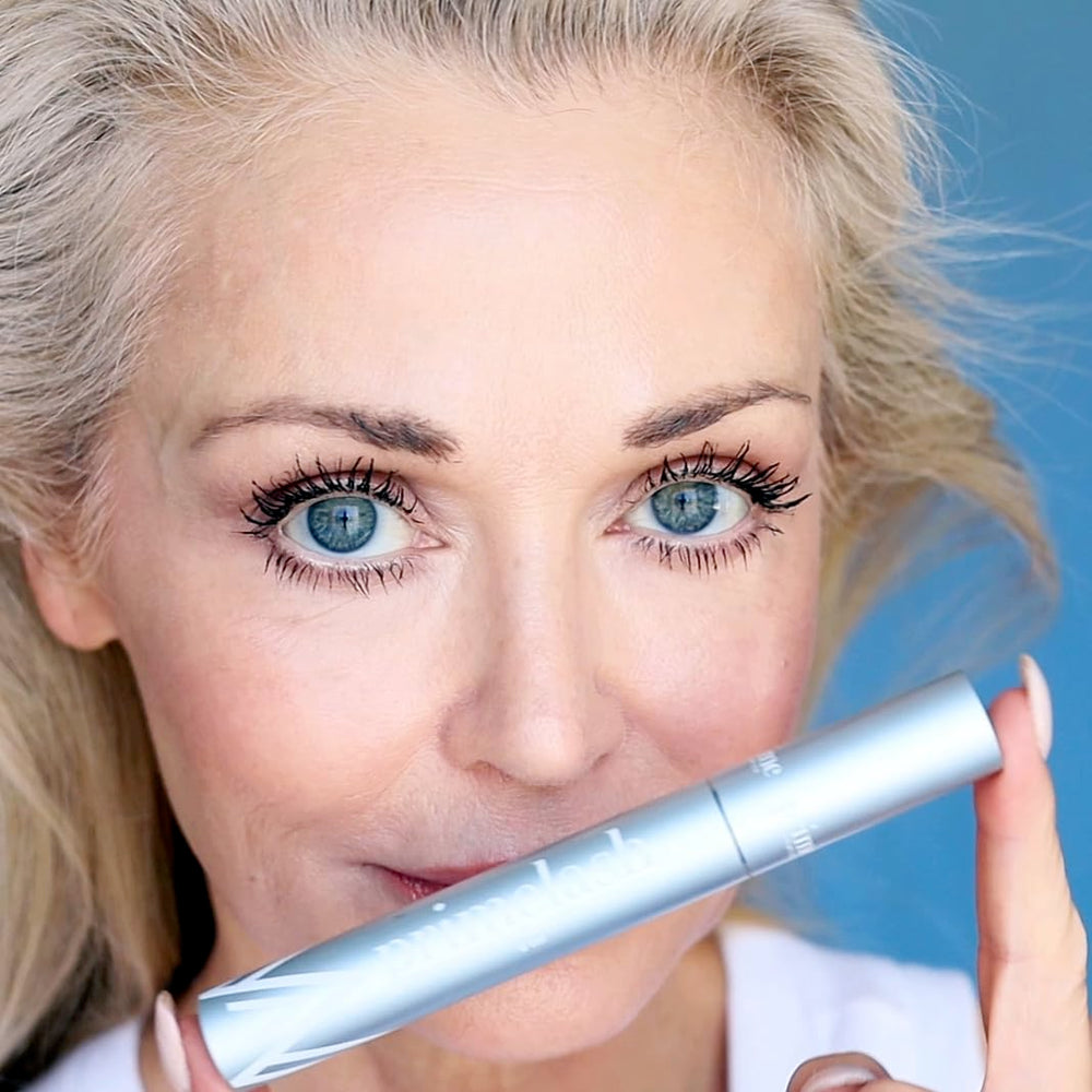 Prime Prometics PrimeLash two-coat look shows lifted, voluminous lashes.