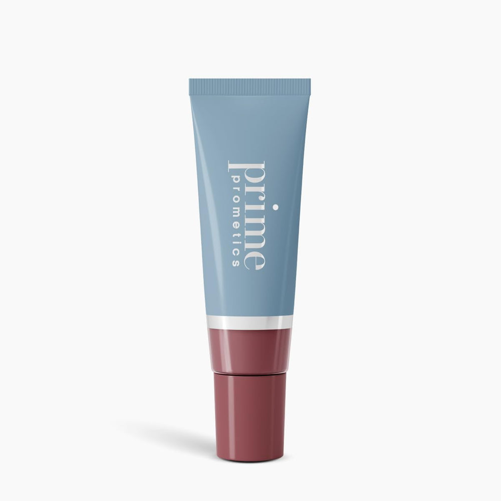 PrimeLip SPF 35 lip oil applied for smooth, protected lips.