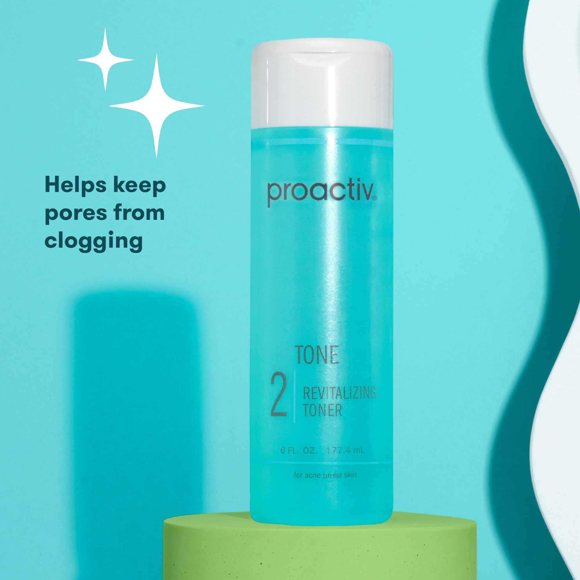 Packaging flatlay with teal bottle and label indicating alcohol-free formula.