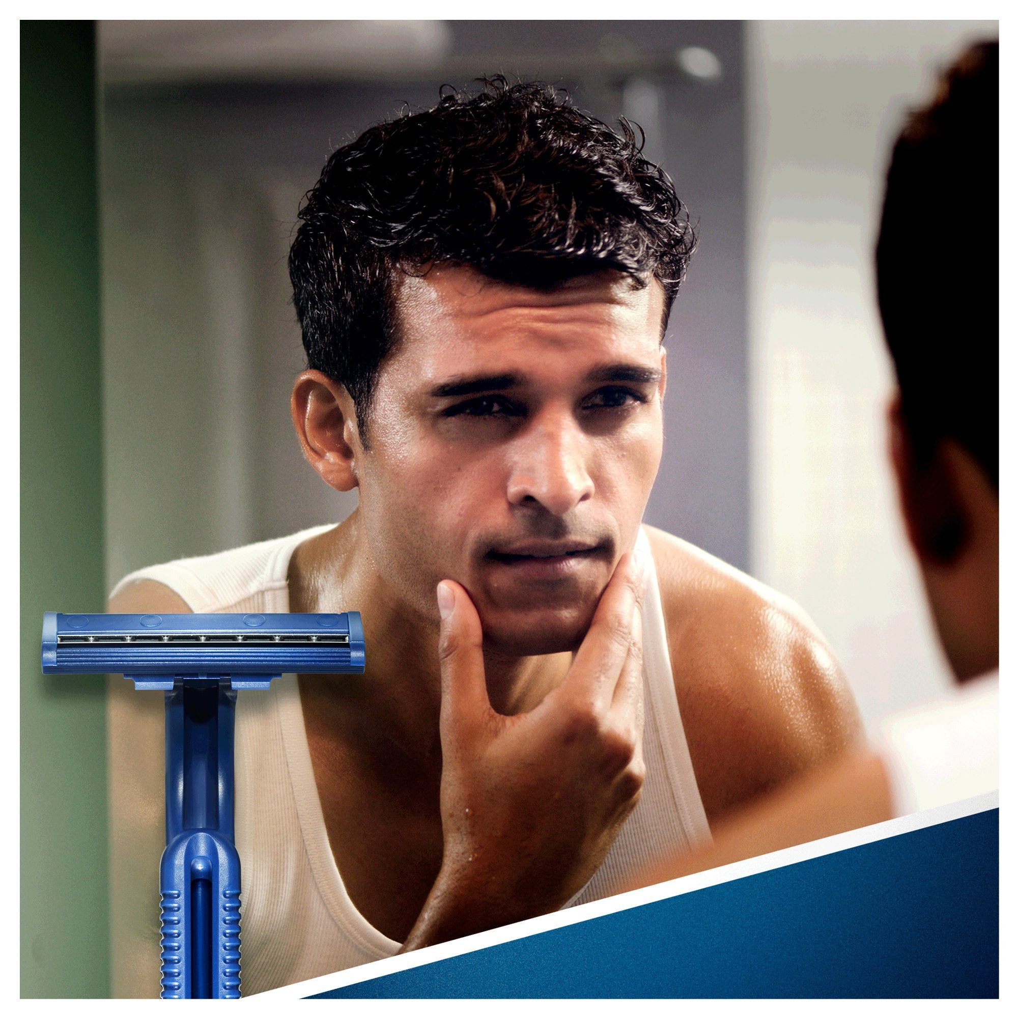BLUE II Disposable Razors 20 in-use shot for quick daily shave.