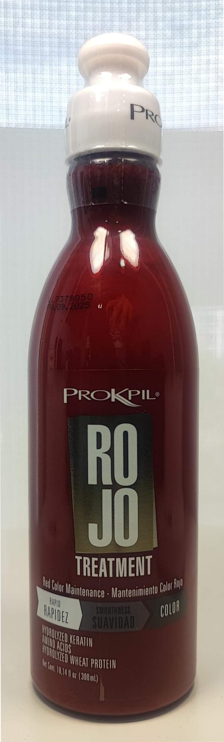 Prokpil Red Maintenance application on hair supports color revival.
