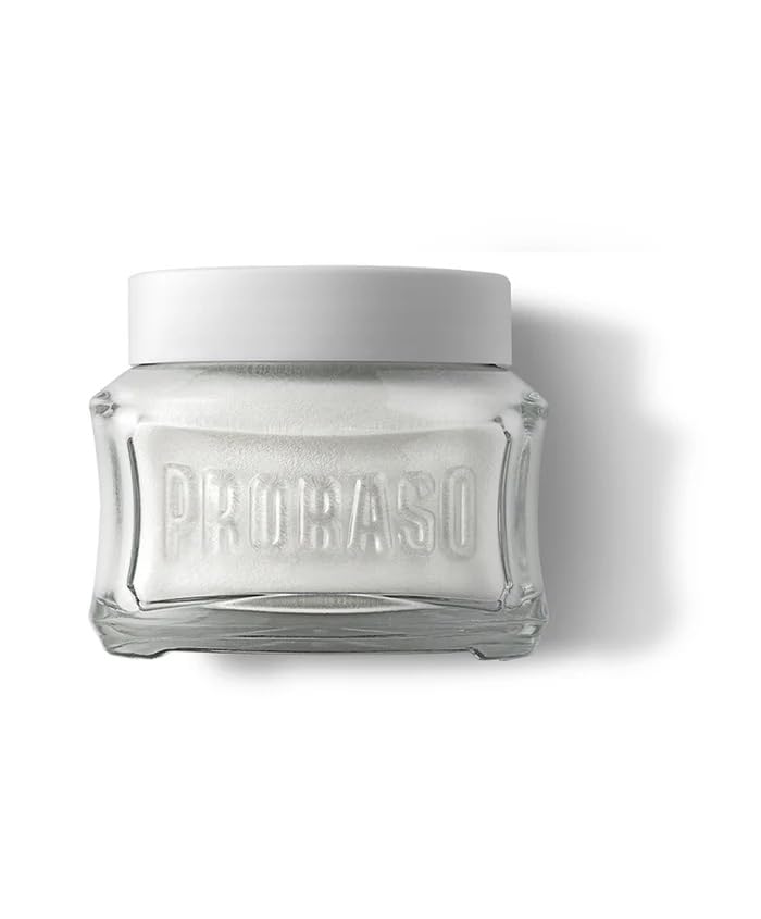 Proraso cream massaged on damp skin for smoother razor glide