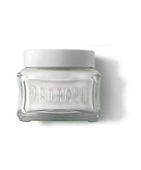 Proraso cream massaged on damp skin for smoother razor glide