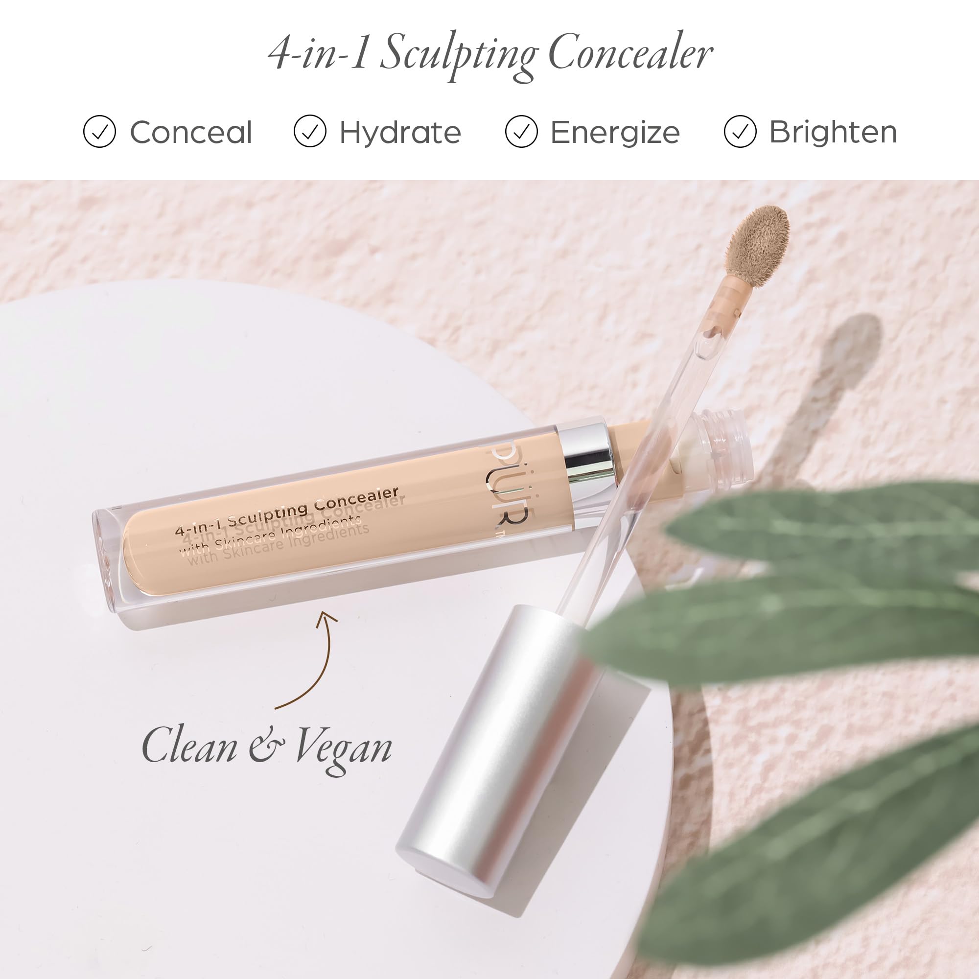 Minimalist tube application of PÜR MINERALS 4-in-1 Sculpting Concealer for smooth coverage.