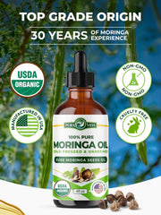 Pura Vida Moringa seeds and label display USDA Organic certification and cold-pressed method.